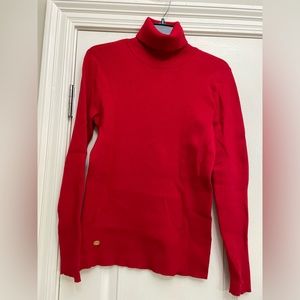 Beautiful red turtleneck long sleeve. Fitted small rib stretch fabric cold wash